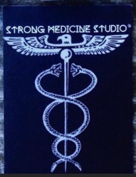 Strong Medicine Studio maker's mark: a winged caduceus under the studio name